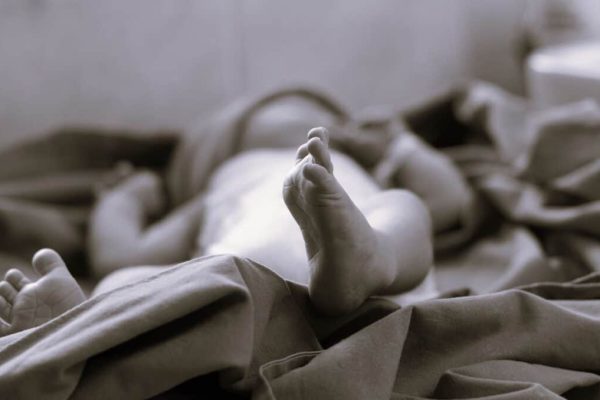 AdobeStock_250596036-newborn-foot-nicu-b-w-resized-1024x678